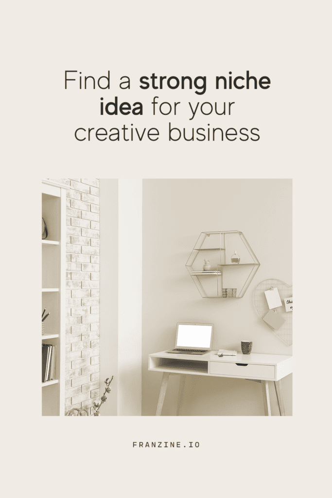Workspace photo with the words: Find a strong niche idea for your creative business